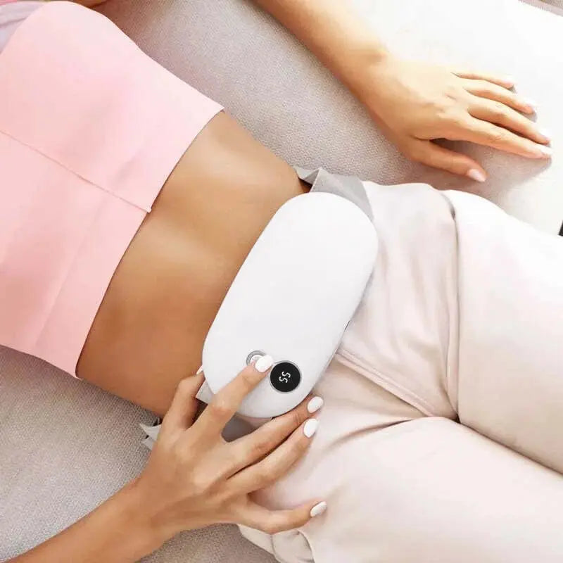 Varmeplade mod menstruationssmerter – varme og massage til lindrende komfort Camera Tech Butik Hvid