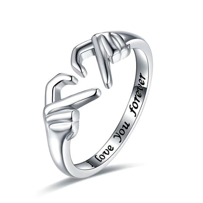 Klemring – Justerbar Ring med Symbolsk Design og Følelsesmæssig Betydning sandsberg20260627 Tech Butik Håndhjerte (sølv)